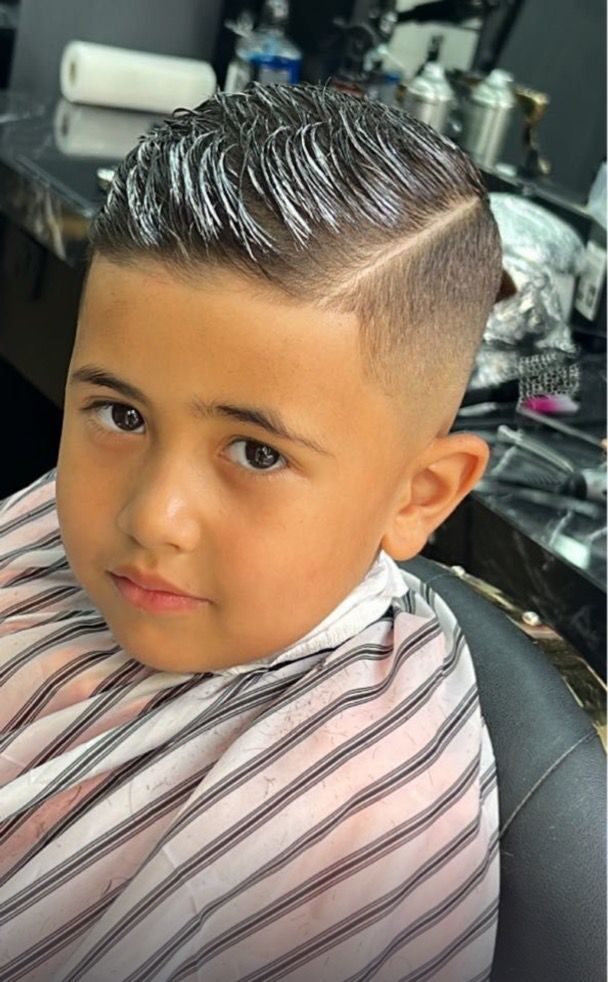 Corte de pelo a niño en Imperial Barbershop